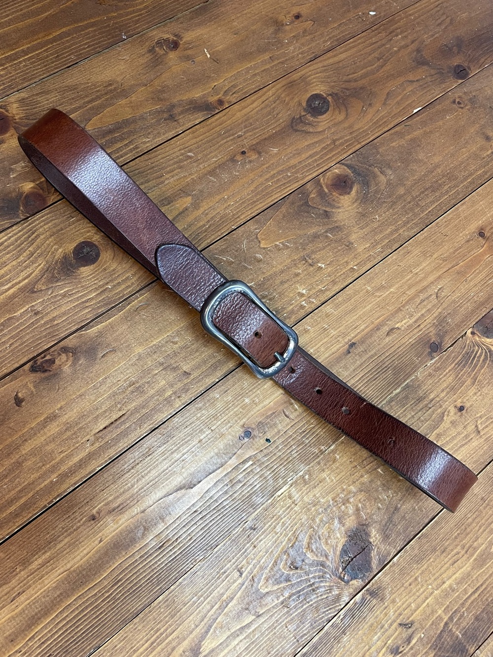 The limited brown leather belt size large